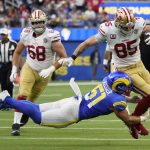 
              Los Angeles Rams inside linebacker Troy Reeder (51) tackles San Francisco 49ers tight end George Kittle (85) during the second half of an NFL football game Sunday, Jan. 9, 2022, in Inglewood, Calif. (AP Photo/Marcio Jose Sanchez)
            