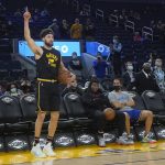 
              Golden State Warriors guard Klay Thompson gestures while warming up before an NBA basketball game between the Warriors and the Miami Heat in San Francisco, Monday, Jan. 3, 2022. (AP Photo/Jeff Chiu)
            