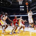 
              Tennessee guard Zakai Zeigler (5) shoots during the first half of the team's NCAA college basketball game against Mississippi on Wednesday, Jan. 5, 2022, in Knoxville, Tenn. (AP Photo/Wade Payne)
            