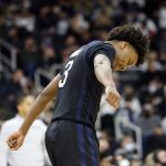 
              Butler guard Chuck Harris (3) reacts after being called for a foul during the second half of an NCAA college basketball game against Providence, Sunday, Jan. 23, 2022, in Providence, R.I. (AP Photo/Mary Schwalm)
            