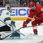 
              San Jose Sharks goaltender James Reimer (47) stops a Detroit Red Wings center Sam Gagner (89) shot in the second period of an NHL hockey game Tuesday, Jan. 4, 2022, in Detroit. (AP Photo/Paul Sancya)
            