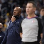 
              Denver Nuggets interim coach Popeye Jones watches during the first half of the team's NBA basketball game against the Sacramento Kings on Friday, Jan. 7, 2022, in Denver. (AP Photo/David Zalubowski)
            