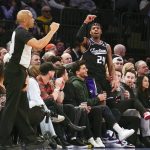 
              Sacramento Kings' Buddy Hield (24) reacts while looking after a shot and falling into the crowd during the second half of the NBA basketball game against the New York Knicks, Monday, Jan. 31, 2022, in New York. The Knicks defeated the Kings 116-96. (AP Photo/Seth Wenig)
            