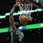 
              Boston Celtics' Jaylen Brown dunks during the second half of an NBA basketball game against the Chicago Bulls, Saturday, Jan. 15, 2022, in Boston. (AP Photo/Michael Dwyer)
            