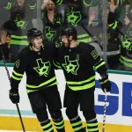 
              Dallas Stars forward Tyler Seguin (91) is congratulated by forward Denis Gurianov (34) after scoring a goal during the third period of an NHL hockey game against the Boston Bruins, Sunday, Jan. 30, 2022, in Dallas. (AP Photo/Brandon Wade)
            