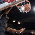 
              Oregon State forward Ahmad Rand dunks during the first half of an NCAA college basketball game against Southern California Thursday, Jan. 13, 2022, in Los Angeles. (AP Photo/Mark J. Terrill)
            