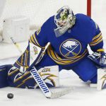 
              Buffalo Sabres goaltender Aaron Dell (80) makes a pad save during the third period of an NHL hockey game against the Detroit Red Wings, Monday, Jan. 17, 2022, in Buffalo, N.Y. (AP Photo/Jeffrey T. Barnes)
            