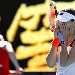 
              Alize Cornet of France reacts after defeating Simona Halep of Romania in their fourth round match at the Australian Open tennis championships in Melbourne, Australia, Monday, Jan. 24, 2022.(AP Photo/Tertius Pickard)
            