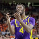 
              LSU forward Darius Days (4) reacts to a call during the second half of an NCAA college basketball game against Auburn Wednesday, Dec. 29, 2021, in Auburn, Ala. (AP Photo/Butch Dill)
            