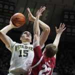 
              Purdue's Zach Edey (15) shoots over Wisconsin's Steven Crowl (22) during the second half of an NCAA basketball game, Monday, Jan. 3, 2022, in West Lafayette, Ind. (AP Photo/Darron Cummings)
            