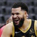 
              Toronto Raptors guard Fred VanVleet (23) laughs on the bench during the second half of the team's NBA basketball game against the Utah Jazz on Friday, Jan. 7, 2022, in Toronto. (Frank Gunn/The Canadian Press via AP)
            