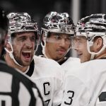 
              Los Angeles Kings center Anze Kopitar, second from left, celebrates his goal with right wing Dustin Brown, right, during the second period of an NHL hockey game Colorado Avalanche Thursday, Jan. 20, 2022, in Los Angeles. (AP Photo/Mark J. Terrill)
            
