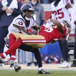 
              San Francisco 49ers cornerback Josh Norman, right, is called for a penalty on a pass intended for Houston Texans wide receiver Brandin Cooks (13) during the second half of an NFL football game in Santa Clara, Calif., Sunday, Jan. 2, 2022. (AP Photo/John Hefti)
            