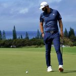 
              FILE - Dustin Johnson looks at his ball on the third green during the second round of the Tournament of Champions golf event, Friday, Jan. 3, 2020, at Kapalua Plantation Course in Kapalua, Hawaii. Johnson did not qualify for the winners-only event this year for only the second time in his career. (AP Photo/Matt York, File)
            