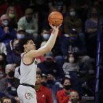 
              Gonzaga guard Julian Strawther shoots during the first half of an NCAA college basketball game against Loyola Marymount, Thursday, Jan. 27, 2022, in Spokane, Wash. (AP Photo/Young Kwak)
            