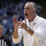 
              Virginia Tech head coach Mike Young yells during the first half of an NCAA college basketball game against North Carolina in Chapel Hill, N.C., Monday, Jan. 24, 2022. (AP Photo/Gerry Broome)
            