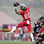 
              National Team wide receiver Corey Sutton makes a catch during the first half of the NFLPA Collegiate Bowl college football game against the American Team, Saturday, Jan. 29, 2022, in Pasadena, Calif. (AP Photo/Marcio Jose Sanchez)
            