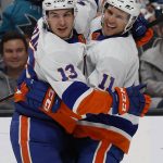 
              New York Islanders center Mathew Barzal (13) celebrates with left wing Zach Parise (11), who scored against the San Jose Sharks during the second period of an NHL hockey game in San Jose, Calif., Thursday, Feb. 24, 2022. (AP Photo/Josie Lepe)
            
