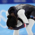 
              Erin Jackson of the United States reacts after winning the gold medal in the speedskating women's 500-meter race at the 2022 Winter Olympics, Sunday, Feb. 13, 2022, in Beijing. (AP Photo/Ashley Landis)
            