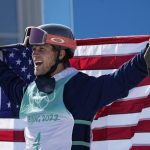 
              Colby Stevenson of the United States celebrates winning silver in the men's freestyle skiing big air finals of the 2022 Winter Olympics, Wednesday, Feb. 9, 2022, in Beijing. (AP Photo/Ashley Landis)
            
