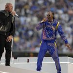 
              Dr. Dre, left, and Snoop Dogg perform during halftime of the NFL Super Bowl 56 football game between the Los Angeles Rams and the Cincinnati Bengals Sunday, Feb. 13, 2022, in Inglewood, Calif. (AP Photo/Marcio Jose Sanchez)
            