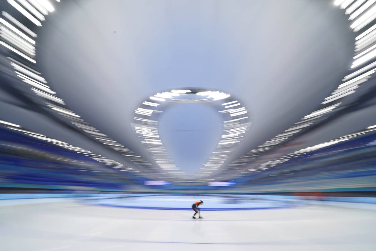An athlete from the Netherlands skates during a speed skating practice session ahead of the 2022 Wi...