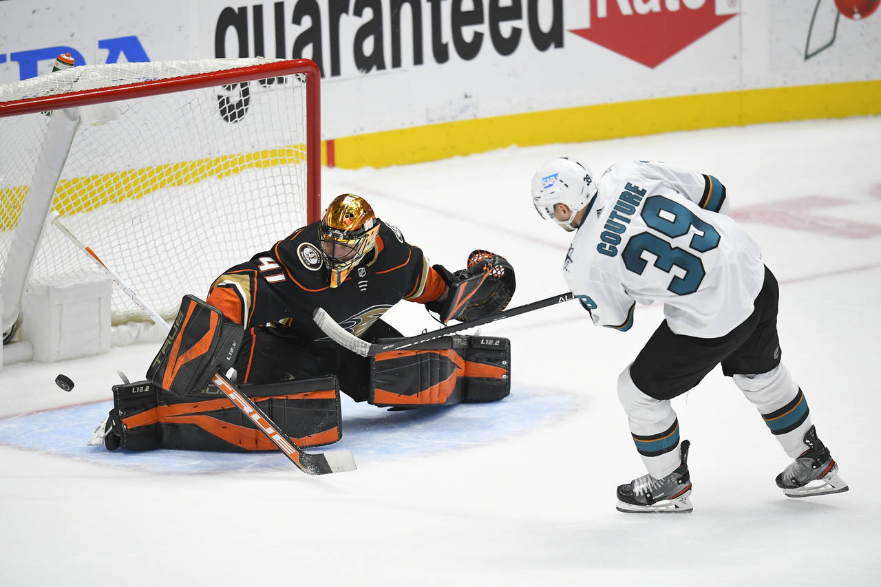 Anaheim Ducks goaltender Anthony Stolarz (41) blocks a shot by San Jose Sharks center Logan Couture...