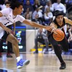 Gonzaga guard Andrew Nembhard, right, steals the ball next to BYU guard Trey Stewart during the second half of an NCAA college basketball game Saturday, Feb. 5, 2022, in Provo, Utah. (AP Photo/Rick Bowmer)