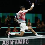 
              Felix Auger-Aliassime of Canada celebrates winning against Stefanos Tsitsipas of Greece in two sets, 6-4, 6-2, in their final men's singles match of the ABN AMRO world tennis tournament at Ahoy Arena in Rotterdam, Netherlands, Sunday, Feb. 13, 2022. (AP Photo/Peter Dejong)
            