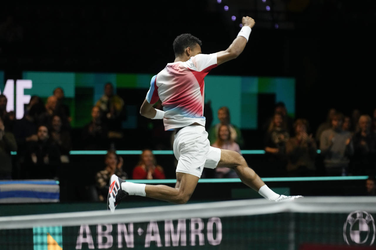 Felix Auger-Aliassime of Canada celebrates winning against Stefanos Tsitsipas of Greece in two sets...