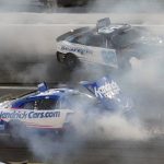 
              Kyle Larson (5) and Noah Gragson (62) crash during the NASCAR Daytona 500 auto race Sunday, Feb. 20, 2022, at Daytona International Speedway in Daytona Beach, Fla. (AP Photo/Chris O'Meara)
            