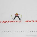 
              Ursa Bogataj, of Slovenia, soars through the air during the women's normal hill individual first round at the 2022 Winter Olympics, Saturday, Feb. 5, 2022, in Zhangjiakou, China. (AP Photo/Andrew Medichini)
            