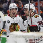 
              Chicago Blackhawks' Dylan Strome (17) and Brandon Hagel (38) celebrate a goal against the Edmonton Oilers during the third period of an NHL hockey game Wednesday, Feb. 9, 2022, in Edmonton, Alberta. (Jason Franson/The Canadian Press via AP)
            