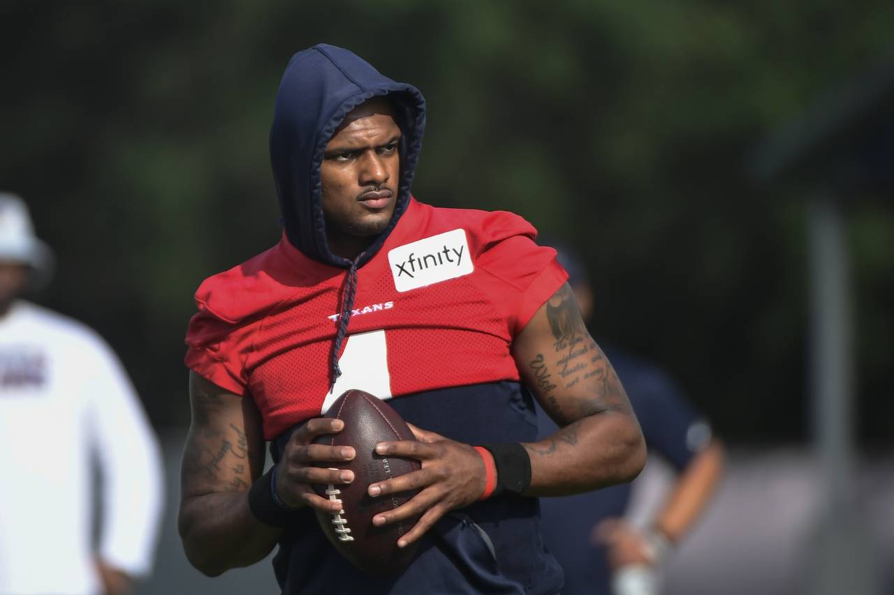 FILE - Texans quarterback Deshaun Watson (4) practices with the team during NFL football practice M...