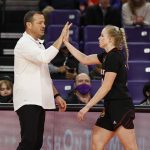 
              Louisville head coach Jeff Walz, left, high-fives Louisville guard Hailey Van Lith as she goes to the bench during the fourth quarter of an NCAA college basketball game against Clemson in Clemson, S.C., Thursday, Feb. 3, 2022. (AP Photo/Nell Redmond)
            