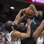 
              Brooklyn Nets guard James Harden (13) is called for a foul as he blocks the shot attempt of Sacramento Kings center Damian Jones during the second half of an NBA basketball game in Sacramento, Calif., Wednesday, Feb. 2, 2022. The Kings won 112-101. (AP Photo/José Luis Villegas)
            