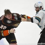 
              Anaheim Ducks left wing Nicolas Deslauriers (20) and San Jose Sharks left wing Jonah Gadjovich (42) fight during the first period in an NHL hockey game Tuesday, Feb. 22, 2022, in Anaheim, Calif. (AP Photo/John McCoy)
            