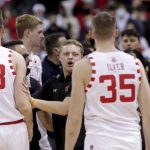 
              Wisconsin and Michigan players and coaches are involved in a scuffle with Michigan head coach Juwan Howard during the waning moments of an NCAA college basketball game Sunday, Feb. 20, 2022, in Madison, Wis. (Mark Hoffman/Milwaukee Journal-Sentinel via AP)
            