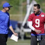 
              Los Angeles Rams offensive coordinator Kevin O'Connell, left, talks with quarterback Matthew Stafford during practice for an NFL Super Bowl football game Wednesday, Feb. 9, 2022, in Thousand Oaks, Calif. The Rams are scheduled to play the Cincinnati Bengals in the Super Bowl on Sunday. (AP Photo/Mark J. Terrill)
            