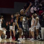
              Murray State's DJ Burns (55) celebrates a 70-68 victory following an NCAA college basketball game against Southeast Missouri State Saturday, Feb. 26, 2022, in Cape Girardeau, Mo. (AP Photo/Jeff Roberson)
            