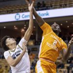 
              Tennessee's Brandon Huntley-Hatfield, right, pulls down a rebound over Missouri's Trevon Brazile during the first half of an NCAA college basketball game Tuesday, Feb. 22, 2022, in Columbia, Mo. (AP Photo/L.G. Patterson)
            
