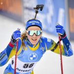 
              FILE - Stina Nilsson of Sweden reacts after crossing the finish line in the women's 7.5 kilometer sprint competition during the IBU World Cup biathlon event in Ostersund, Sweden, on March 19, 2021. Nilsson was at the top of her game after winning four medals at the 2018 Winter Olympics and two World Championship titles in 2019. But Nilsson shocked the Nordic community when she announced in 2020 that she was leaving one of the strongest cross country teams in the world to try her hand at biathlon. (Anders Wiklund/TT via AP, File)
            