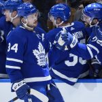 
              Toronto Maple Leafs forward Auston Matthews is congratulated after his second goal of the night against the Minnesota Wild, during the third period of an NHL hockey game Thursday, Feb. 24, 2022, in Toronto. (Nathan Denette/The Canadian Press via AP)
            
