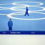 
              Medical personnel stand ready for activity during a scheduled speedskating practice session inside at the National Speed Skating Oval the 2022 Winter Olympics, Thursday, Jan. 27, 2022, in Beijing. (AP Photo/Jeff Roberson)
            