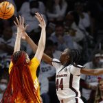 
              South Carolina's Saniya Rivers (44) shoots as Tennessee's Tamari Key (20) defends during the first half of an NCAA college basketball game Sunday, Feb, 20, 2022, in Columbia, S.C. (Tracy Glantz/The State via AP)
            