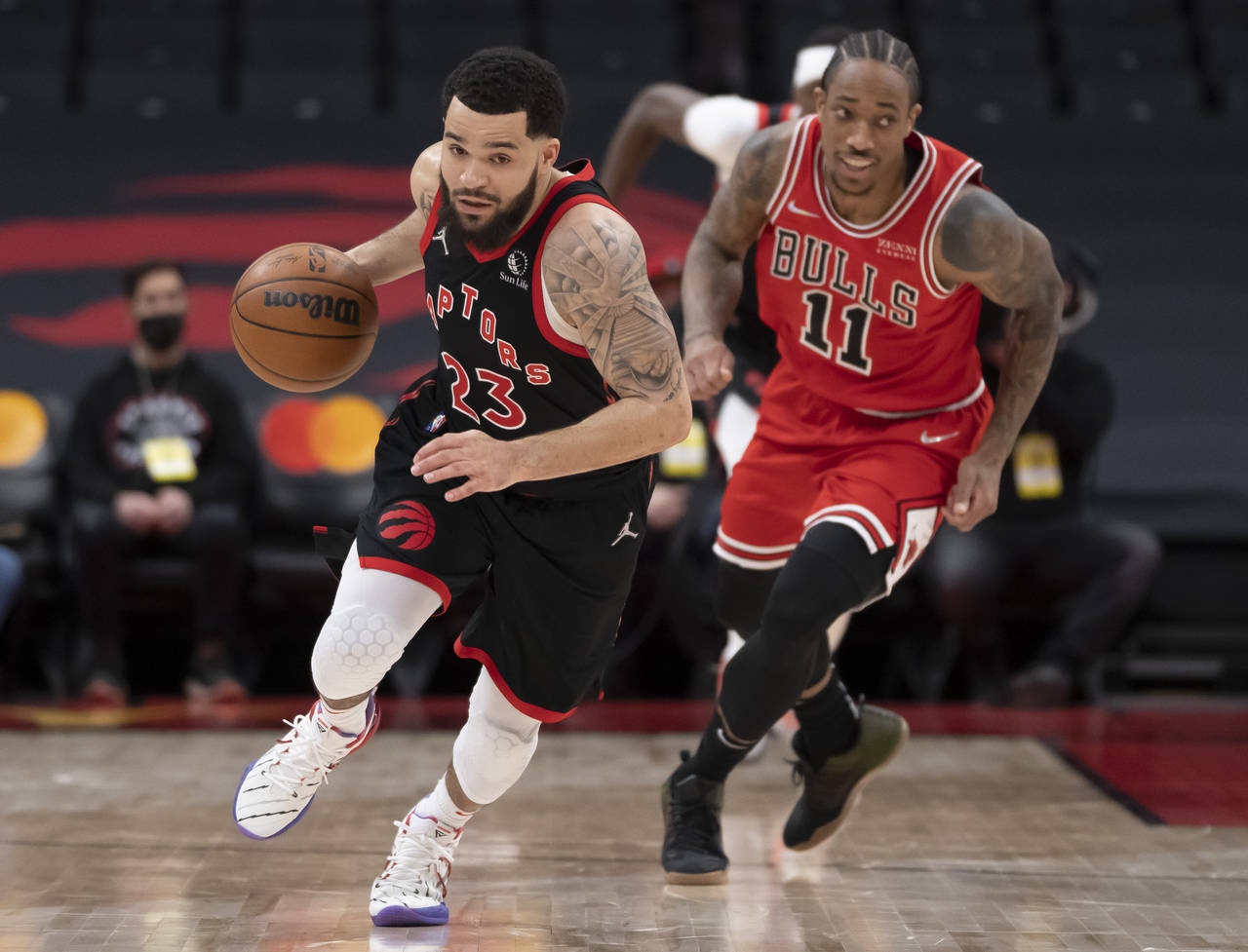 Toronto Raptors guard Fred VanVleet (23) takes off up court after stealing the ball from Chicago Bu...