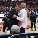 
              Duke coach Mike Krzyzewski, left, greets Syracuse coach Jim Boeheim before an NCAA college basketball game in Syracuse, N.Y., Saturday, Feb. 26, 2022. (AP Photo/Adrian Kraus)
            