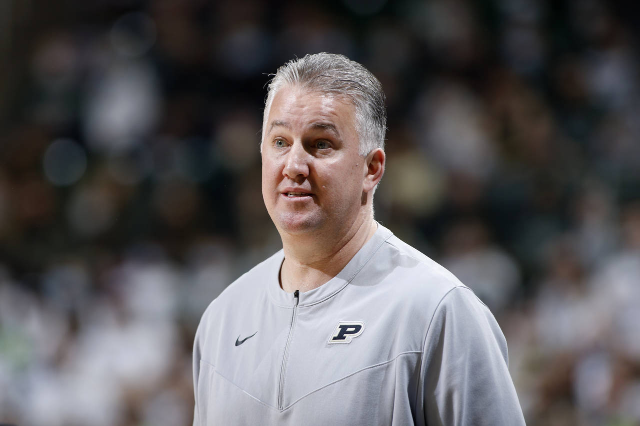Purdue coach Matt Painter watches during the first half of an NCAA college basketball game against ...