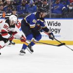 
              New Jersey Devils left wing Tomas Tatar (90) pressures St. Louis Blues left wing Pavel Buchnevich (89) during the second period of an NHL hockey game Thursday, Feb. 10, 2022, in St. Louis. (AP Photo/Joe Puetz)
            