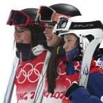 
              From left, silver medalist United State's Jaelin Kauf, gold medalist Australia's Jakara Anthony and bronze medalist Anastasiia Smirnva, of the Russian Olympic Committee, pose for pictures after the women's moguls finals at Genting Snow Park at the 2022 Winter Olympics, Sunday, Feb. 6, 2022, in Zhangjiakou, China. (AP Photo/Gregory Bull)
            